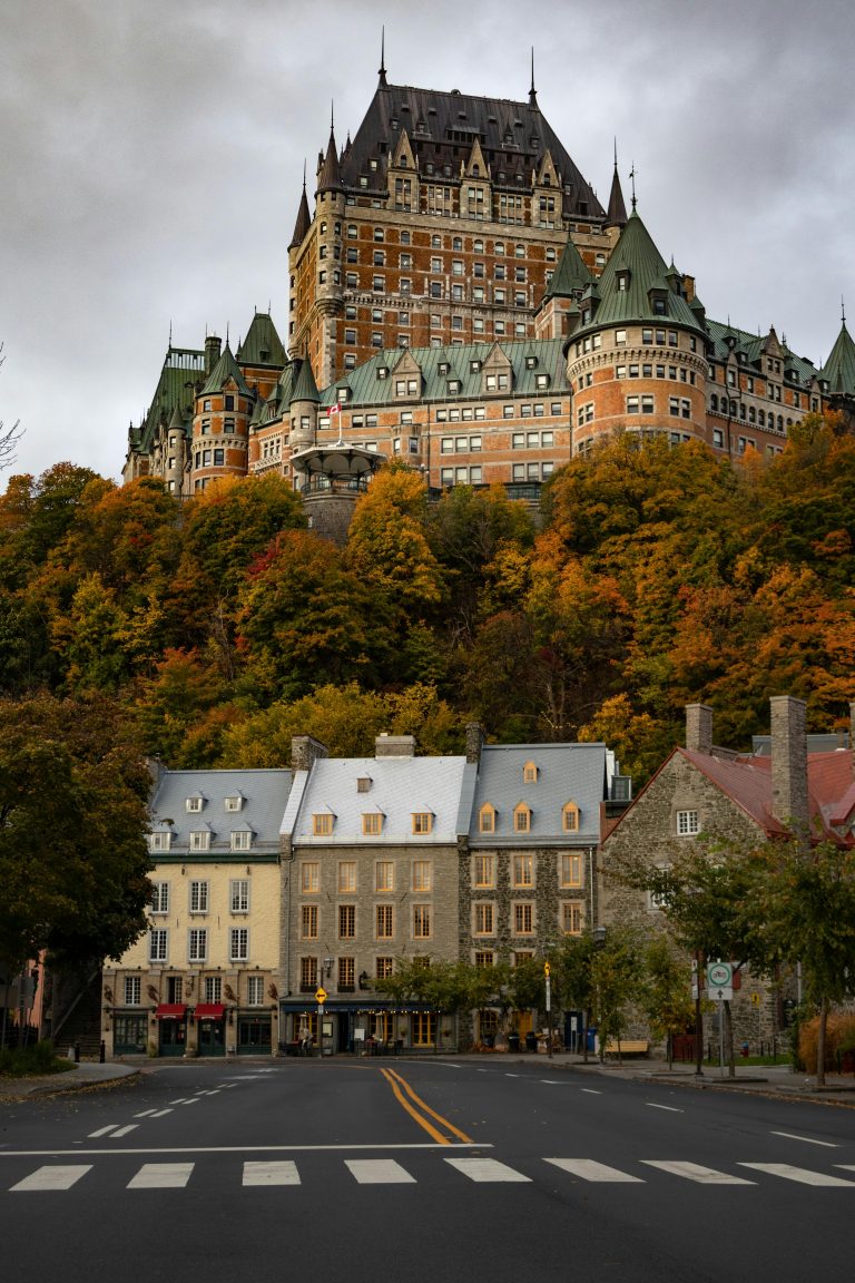 Stunning view of Château Frontenac during autumn in Quebec City, showcasing gothic architecture.